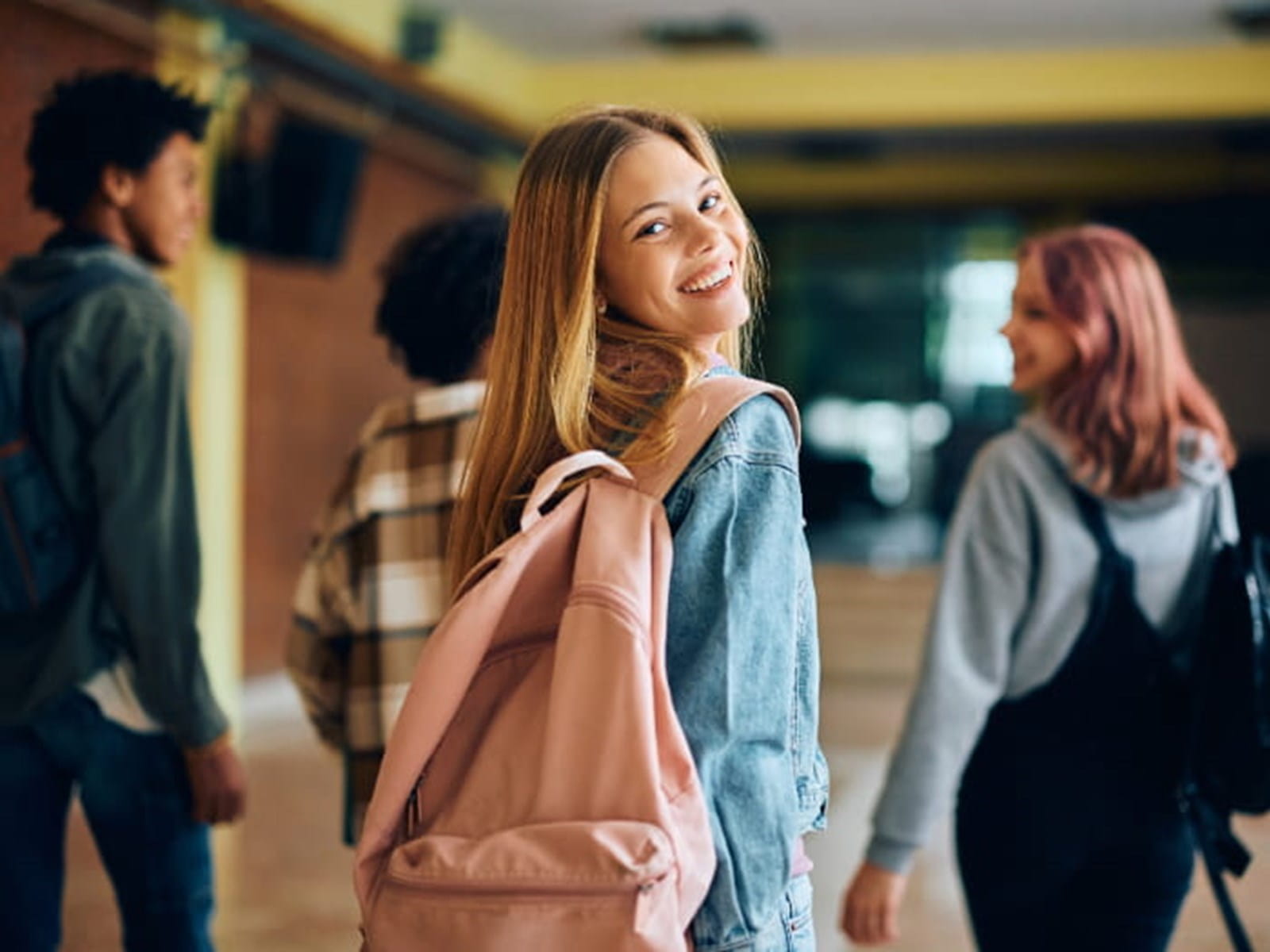 Girl in pink back pack