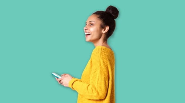 Young woman in yellow jumper