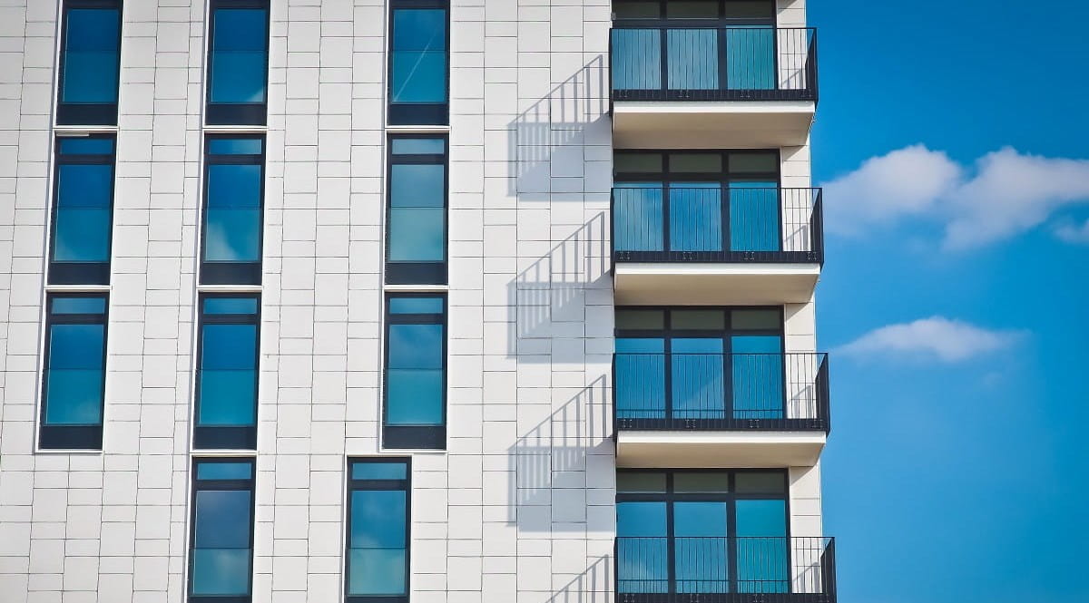 Flats against blue sky