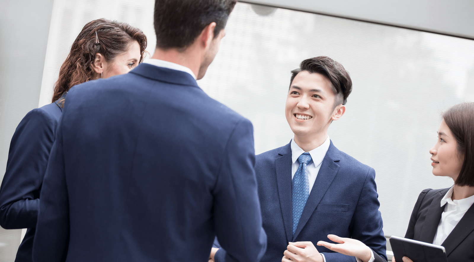 Young men shaking hands