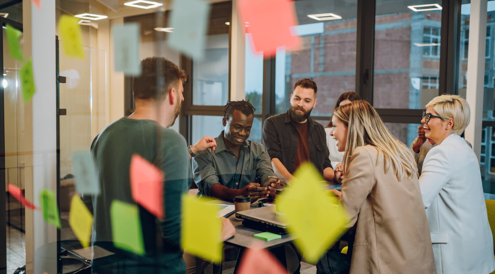 Group of people at a table working collaboratively