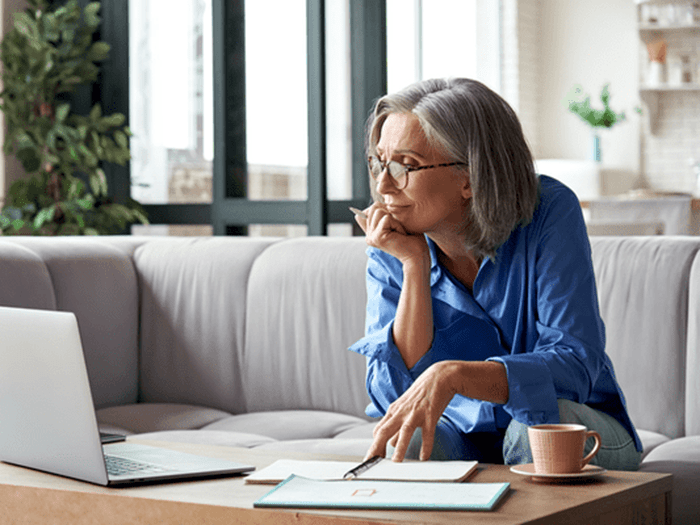 Mature woman using laptop