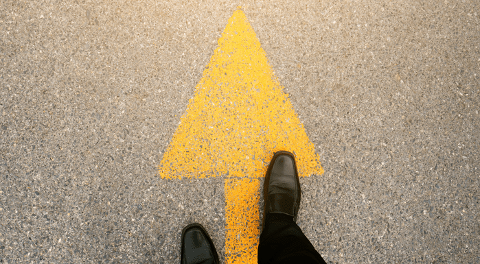 Coins in jeans pocket Shoes and arrow